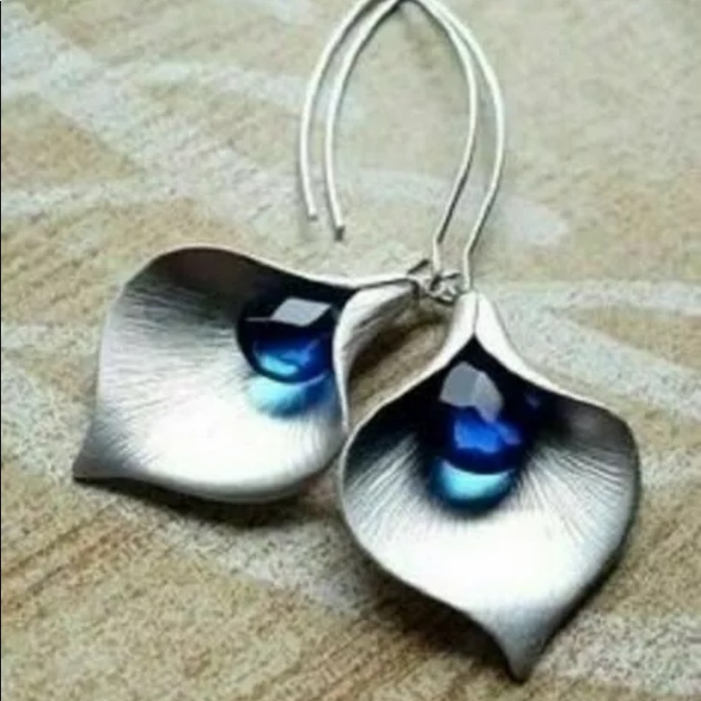 Sterling silver drop earrings.